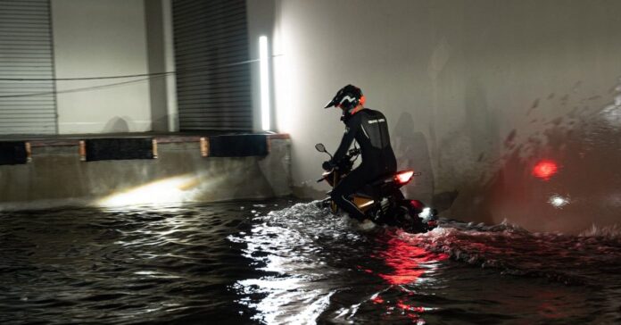 Watch this electric motorcycle ride battery deep through California flood waters