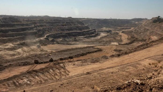 A view of mines with terraces etched in the landscape.