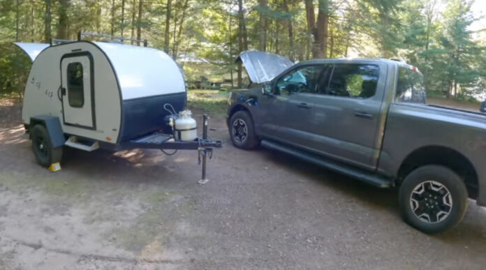 Adventurer Circles Lake Superior In An F-150 Lightning
